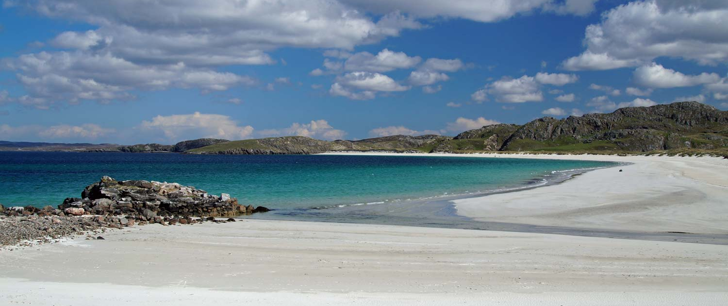 an empty beach with white sands
